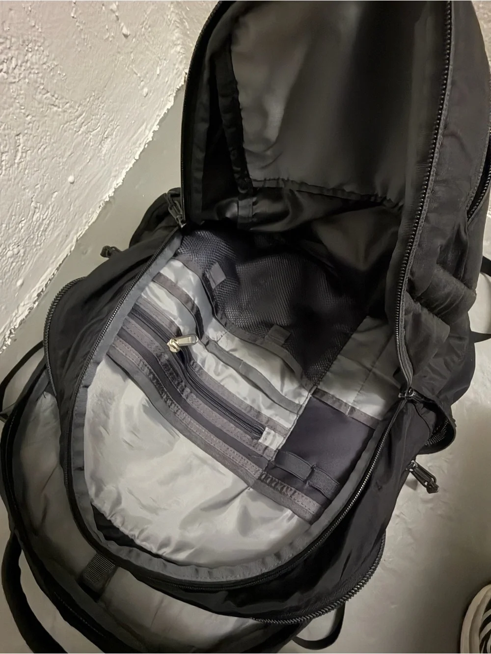 The North Face Black Padded Daypack with Front Logo
